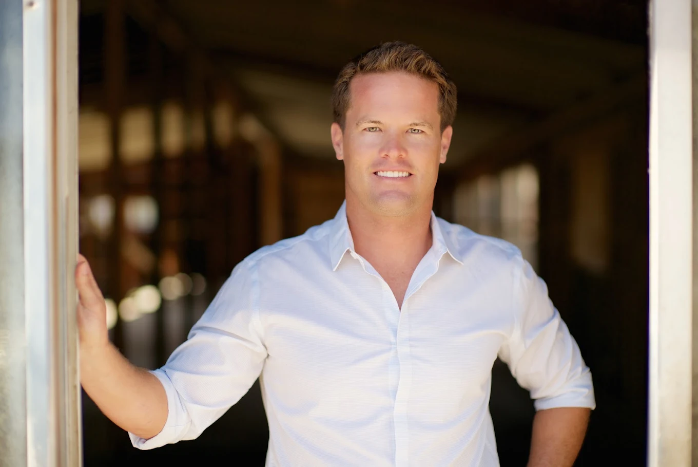 Mike Edwards in a white shirt at a doorway, El Segundo real estate agent